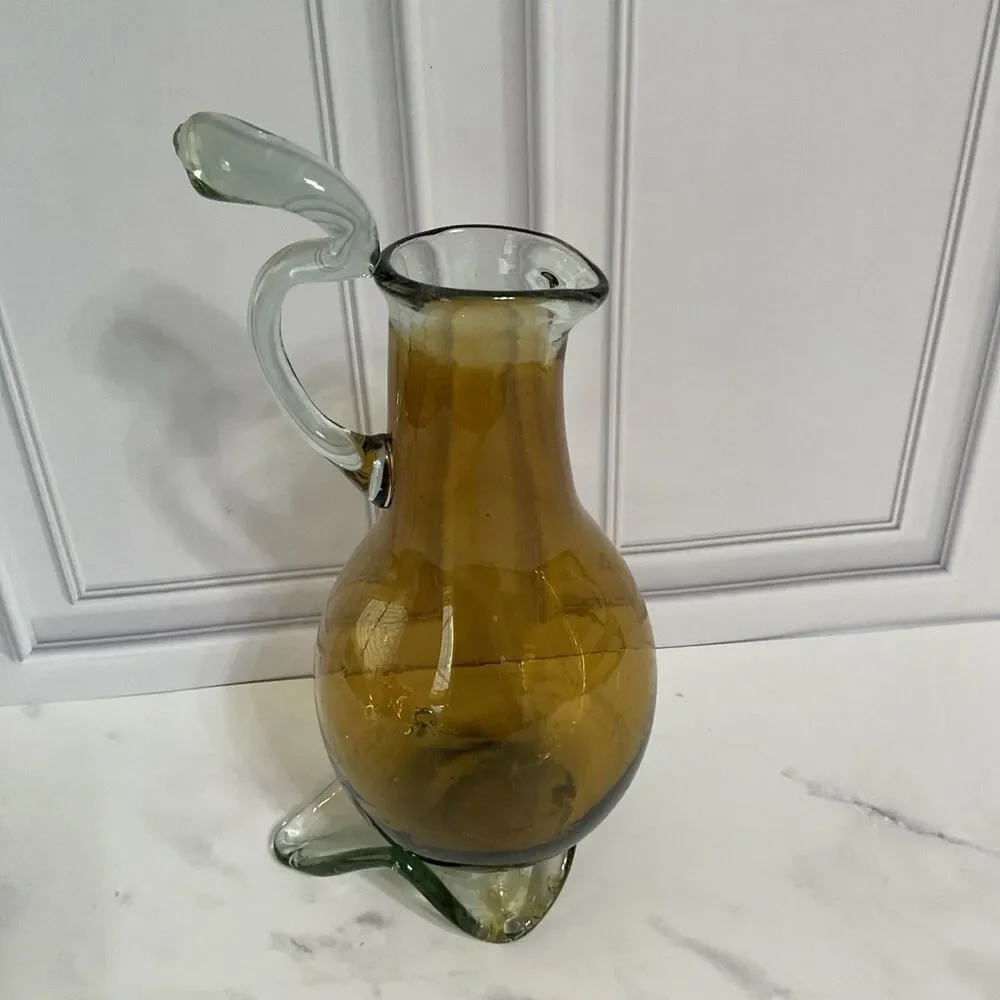 Hand Blown Glass Amber Pitcher with attached Clear Handle 10.5”Tall Clear Base